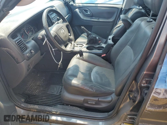 2006 Mazda Tribute S with VIN 4F2YZ06166KM08346, listed as a Copart auction lot 46318214 with 78,615 mi miles and Salvage Title. Bid and sale history available at DreamBid. Image 7.