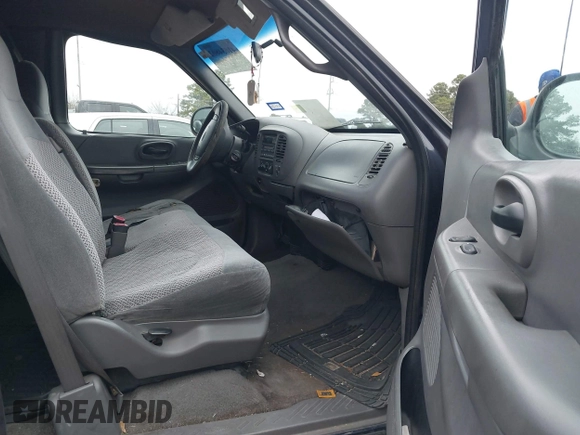 1999 Ford F-150 with VIN 1FTRX07W3XKC24438, listed as a IAAI auction lot 41634802 with Not provided miles and . Bid and sale history available at DreamBid. Image 5.