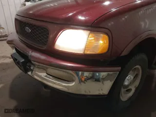 1998 Ford F-150 Standard with VIN 1FTZX18W8WKA19037, listed as a IAAI auction lot 40977819 with 137,119 mi miles. Bid and sale history available at carsss.com. Image 6.