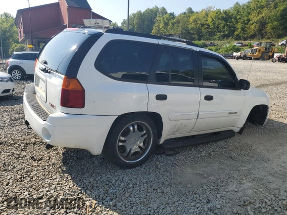 2005 GMC Envoy SLT with VIN 1GKDT13S552329269, listed as a Copart auction lot 69209244 with 154,595 mi miles and Salvage Title. Bid and sale history available at carsss.com. Image 3.