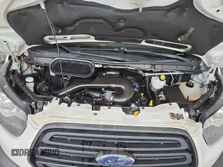 2019 Ford Transit with VIN 1FTYR2CM5KKA04040, listed as a IAAI auction lot 42715725 with 175,169 mi miles and . Bid and sale history available at DreamBid. Image 23.