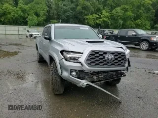 2023 Toyota Tacoma SR with VIN 3TMCZ5AN4PM566647, listed as a Copart auction lot 64062034 with 43,154 mi miles and Salvage title. Bid and sale history available at DreamBid. Image 10.