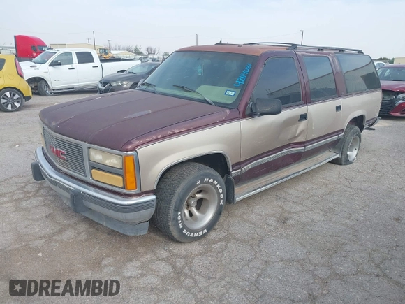 1993 GMC Suburban with VIN 1GKEC16KXPJ734150, listed as a IAAI auction lot 42114021 with 254,501 mi miles and . Bid and sale history available at DreamBid. Image 2.