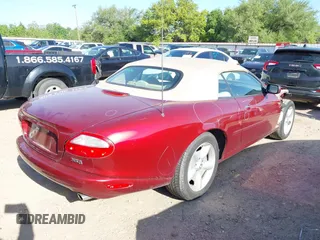 1997 Jaguar XK with VIN SAJGX2748VC011754, listed as a IAAI auction lot 41979459 with 34,601 mi miles and . Bid and sale history available at DreamBid. Image 4.