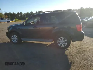 2011 Mazda Tribute Touring with VIN 4F2CY0C70BKM02624, listed as a Copart auction lot 75472464 with 172,077 mi miles and Salvage Title. Bid and sale history available at carsss.com. Image 2.