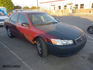 2000 Toyota Camry CE with VIN 4T1BG22K9YU688451, listed as a IAAI auction lot 42066777 with 210,221 mi miles. Bid and sale history available at carsss.com. Image 1.