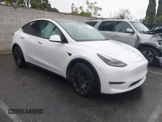 2021 Tesla Model Y Performance with VIN 5YJYGDEF2MF230374, listed as a IAAI auction lot 41708828 with 20,272 mi miles. Bid and sale history available at carsss.com. Image 1.