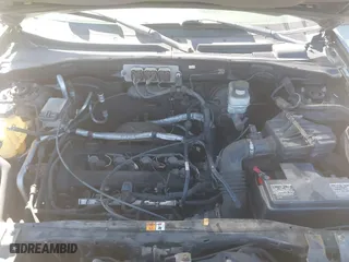 2007 Ford Escape XLS with VIN 1FMYU92Z77KB08603, listed as a IAAI auction lot 41858410 with 144,830 mi miles. Bid and sale history available at carsss.com. Image 10.