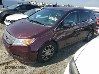 2013 Honda Odyssey EX-L with VIN 5FNRL5H65DB054048, listed as a Copart auction lot 53679505 with 150,376 mi miles and Salvage title. Bid and sale history available at DreamBid. Image 1.