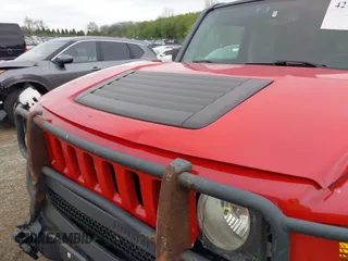 2007 Hummer H3 SUV with VIN 5GTDN13E978240989, listed as a IAAI auction lot 42169980 with 136,129 mi miles. Bid and sale history available at carsss.com. Image 6.
