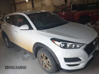 2019 Hyundai Tucson SE with VIN KM8J2CA40KU959732, listed as a IAAI auction lot 39938091 with 89,423 mi miles. Bid and sale history available at carsss.com. Image 1.