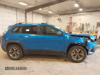 2019 Jeep Cherokee Trailhawk with VIN 1C4PJMBX4KD389637, listed as a IAAI auction lot 41740750 with 46,695 mi miles and . Bid and sale history available at DreamBid. Image 13.