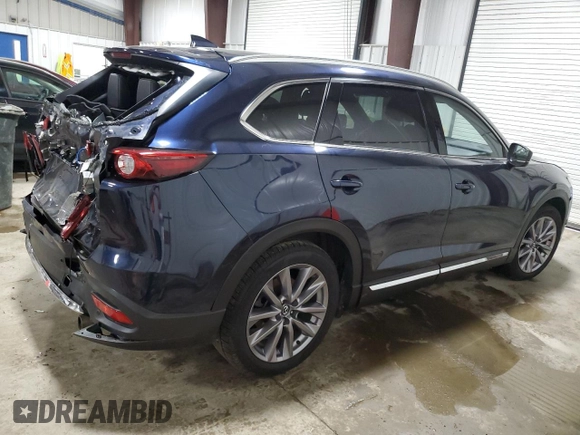 2023 Mazda CX-9 Grand Touring with VIN JM3TCBDY1P0630868, listed as a Copart auction lot 56321205 with 50,427 mi miles and Salvage title. Bid and sale history available at DreamBid. Image 3.