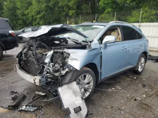 2012 Lexus RX 450h with VIN JTJBC1BA7C2428049, listed as a Copart auction lot 60290195 with 242,822 mi miles and Salvage title. Bid and sale history available at DreamBid. Image 1.