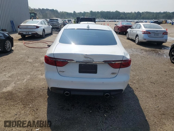 2016 Jaguar XF 35t Prestige with VIN SAJBK4BV5GCY17025, listed as a Copart auction lot 62923794 with 100,778 mi miles and Salvage Title. Bid and sale history available at carsss.com. Image 6.