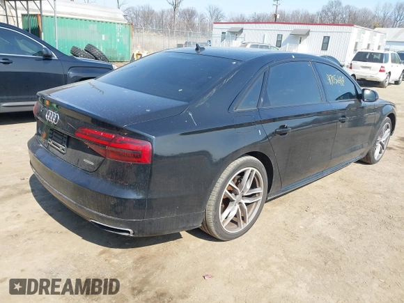 2017 Audi A8 with VIN WAU44AFDXHN004395, listed as a IAAI auction lot 41705688 with 63,282 mi miles and . Bid and sale history available at DreamBid. Image 4.