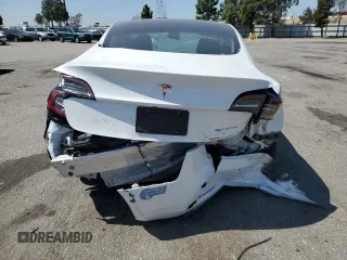 2021 Tesla Model 3 Long Range z VIN 5YJ3E1EB2MF007067, wystawiony jako Copart lot #52584715 z przebiegiem 31 311 mil mil oraz Szkoda całkowita • Salvage title. Historia ofert i sprzedaży dostępna na DreamBid. Obrazek 6.