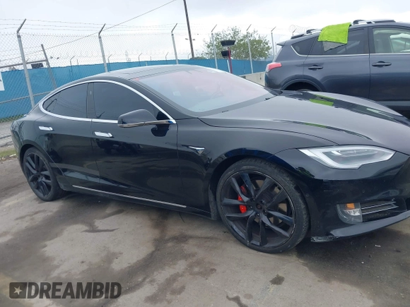2018 Tesla Model S 75D with VIN 5YJSA1E42JF265691, listed as a IAAI auction lot 41886105 with 99,485 mi miles and . Bid and sale history available at DreamBid. Image 13.