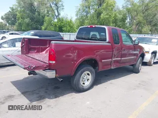 1998 Ford F-150 with VIN 1FTZX18W9WKC09638, listed as a IAAI auction lot 42576838 with 140,714 mi miles and . Bid and sale history available at DreamBid. Image 4.