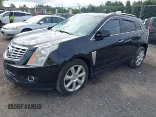 2015 Cadillac SRX Performance Collection with VIN 3GYFNFE35FS591343, listed as a IAAI auction lot 42644949 with 118,718 mi miles and . Bid and sale history available at DreamBid. Image 20.
