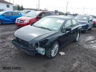 2012 Subaru Impreza Sedan 2.0i Premium with VIN JF1GJAD68CH026938, listed as a IAAI auction lot 41751422 with 138,638 mi miles. Bid and sale history available at carsss.com. Image 2.