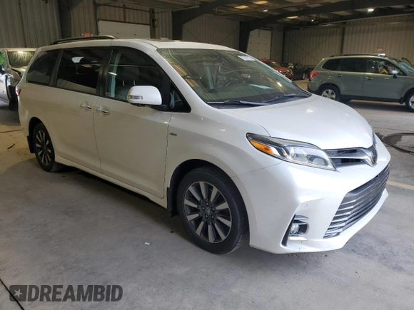 2018 Toyota Sienna XLE with VIN 5TDDZ3DC9JS204307, listed as a Copart auction lot 57327715 with 70,886 mi miles and Salvage title. Bid and sale history available at DreamBid. Image 4.