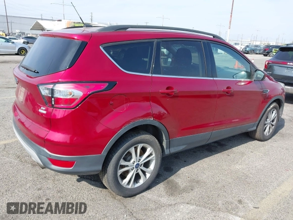 2017 Ford Escape SE with VIN 1FMCU0GD4HUC27041, listed as a IAAI auction lot 42127328 with 107,860 mi miles. Bid and sale history available at carsss.com. Image 4.