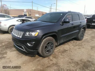 2014 Jeep Grand Cherokee Laredo with VIN 1C4RJEAG3EC393866, listed as a IAAI auction lot 41863877 with 134,977 mi miles. Bid and sale history available at carsss.com. Image 17.