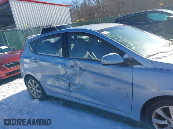 2012 Hyundai Accent SE with VIN KMHCU5AEXCU032097, listed as a IAAI auction lot 41143303 with 29,828 mi miles. Bid and sale history available at carsss.com. Image 6.