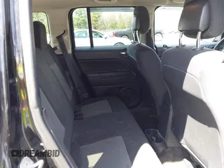 2014 Jeep Patriot Sport with VIN 1C4NJRBB1ED811019, listed as a IAAI auction lot 42181813 with 124,837 mi miles and . Bid and sale history available at DreamBid. Image 8.