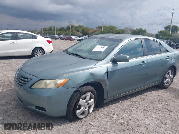 2007 Toyota Camry CE with VIN 4T1BE46K37U569515, listed as a IAAI auction lot 41974482 with 242,042 mi miles. Bid and sale history available at carsss.com. Image 6.