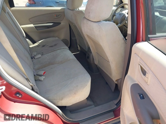 2009 Hyundai Tucson Limited with VIN KM8JN72D79U933958, listed as a IAAI auction lot 42006262 with 143,502 mi miles. Bid and sale history available at carsss.com. Image 8.