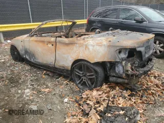 2011 BMW 1 Series 135i with VIN WBAUN7C52BVM23944, listed as a Copart auction lot 84061924 with Not provided miles and Salvage title. Bid and sale history available at DreamBid. Image 2.