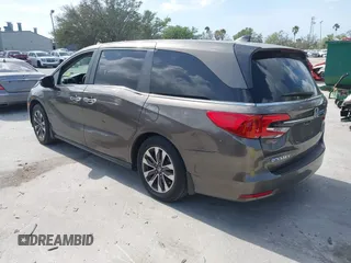 2022 Honda Odyssey EX-L with VIN 5FNRL6H77NB031502, listed as a IAAI auction lot 41706098 with 57,074 mi miles and . Bid and sale history available at DreamBid. Image 3.