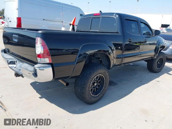 2014 Toyota Tacoma PreRunner with VIN 3TMKU4HN0EM040104, listed as a IAAI auction lot 41619179 with 171,542 mi miles and . Bid and sale history available at DreamBid. Image 4.