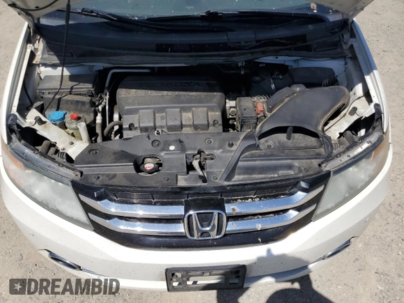 2017 Honda Odyssey Touring z VIN 5FNRL5H93HB015863, wystawiony jako Copart lot #56926815 z przebiegiem 267 380 mil mil oraz Szkoda całkowita • Salvage title. Historia ofert i sprzedaży dostępna na DreamBid. Obrazek 12.