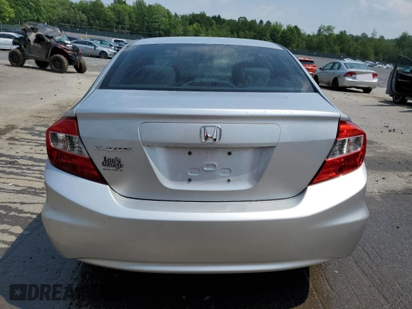 2012 Honda Civic LX с VIN 19XFB2F5XCE348936, выставлен на аукционе Copart как лот 60262265 с пробегом 199 721 миль миль и Списание • Salvage title. История ставок и продаж доступна на DreamBid. Изображение 6.
