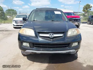 2006 Acura MDX Touring w/Navi with VIN 2HNYD18886H530531, listed as a IAAI auction lot 42045364 with 174,528 mi miles. Bid and sale history available at carsss.com. Image 6.