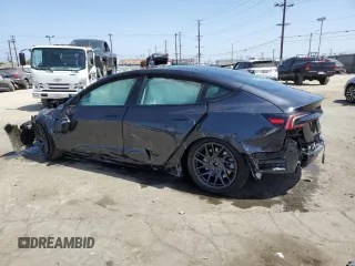 2025 Tesla Model 3 Long Range with VIN 5YJ3E1EA5SF999984, listed as a Copart auction lot 58244825 with Not provided miles and Salvage title. Bid and sale history available at DreamBid. Image 2.