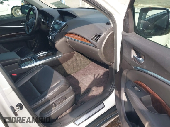 2017 Acura MDX Technology z VIN 5FRYD4H56HB041081, wystawiony jako IAAI lot #41673338 z przebiegiem 115 198 mil mil oraz . Historia ofert i sprzedaży dostępna na DreamBid. Obrazek 5.