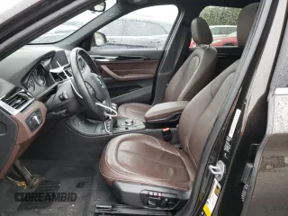 2018 BMW X1 xDrive28i with VIN WBXHT3C37J5K26738, listed as a Copart auction lot 35778903 with 34,916 mi miles. Bid and sale history available at carsss.com. Image 7.