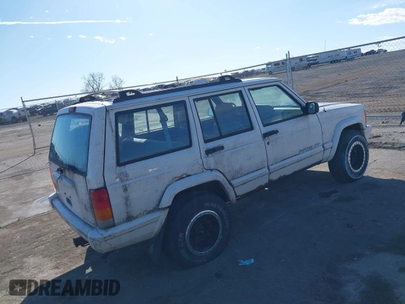 1999 Jeep Cherokee Sport with VIN 1J4FF68S0XL628564, listed as a IAAI auction lot 41508373 with 244,596 mi miles and . Bid and sale history available at DreamBid. Image 4.