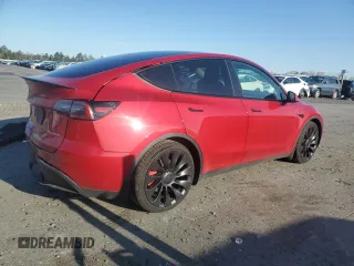 2023 Tesla Model Y Performance with VIN 7SAYGDEF4PF960357, listed as a Copart auction lot 51126105 with 37,252 mi miles and Salvage Title. Bid and sale history available at DreamBid. Image 3.