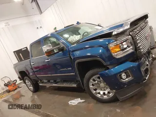 2015 GMC Sierra 2500HD Denali z VIN 1GT120E86FF655301, wystawiony jako IAAI lot #41965001 z przebiegiem 74 136 mil mil oraz . Historia ofert i sprzedaży dostępna na DreamBid. Obrazek 14.