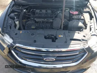 2014 Ford Taurus Limited with VIN 1FAHP2F80EG104984, listed as a IAAI auction lot 41910463 with 174,034 mi miles. Bid and sale history available at carsss.com. Image 10.