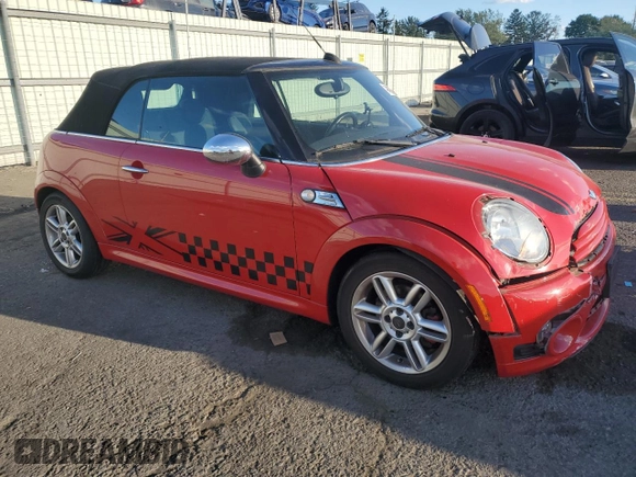 2011 MINI Convertible с VIN WMWZN3C55BT133269, выставлен на аукционе Copart как лот 74062294 с пробегом 48 582 миль миль и Списание • Salvage title. История ставок и продаж доступна на DreamBid. Изображение 4.