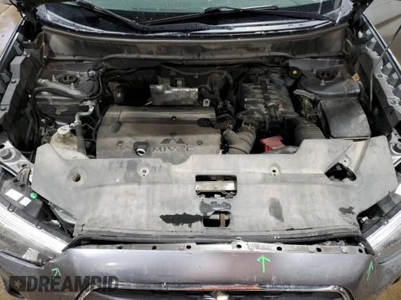2015 Mitsubishi Outlander SE with VIN 4A4AP4AU6FE008763, listed as a Copart auction lot 58772365 with 130,749 mi miles and Salvage title. Bid and sale history available at DreamBid. Image 12.