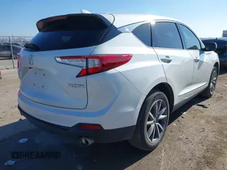 2020 Acura RDX Technology with VIN 5J8TC1H59LL011089, listed as a IAAI auction lot 41246036 with 66,261 mi miles and . Bid and sale history available at DreamBid. Image 4.