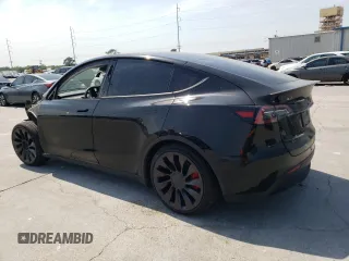 2023 Tesla Model Y Performance with VIN 7SAYGDEF9PF947667, listed as a Copart auction lot 52314795 with 40,634 mi miles and Salvage Title. Bid and sale history available at DreamBid. Image 2.