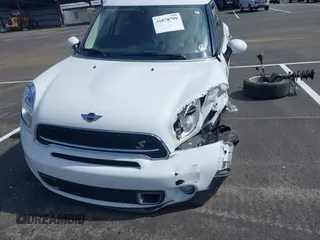 2016 MINI Countryman S with VIN WMWZC3C51GWT10458, listed as a IAAI auction lot 41878799 with 112,019 mi miles and . Bid and sale history available at DreamBid. Image 12.